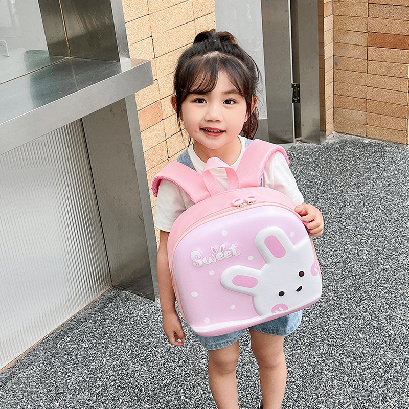 Jardín de infantes lindas mochila de dibujos animados para niños, mochila de cáscara de huevo de conejo, mini mochila para niños y niñas.