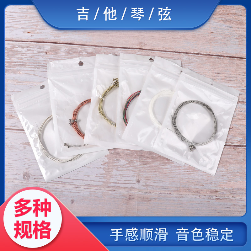 Cuerdas de guitarra cuerdas de color folk guitarra acústica cuerdas de acero 6 cuerdas a granel folk compra directa de fábrica cuerdas de guitarra