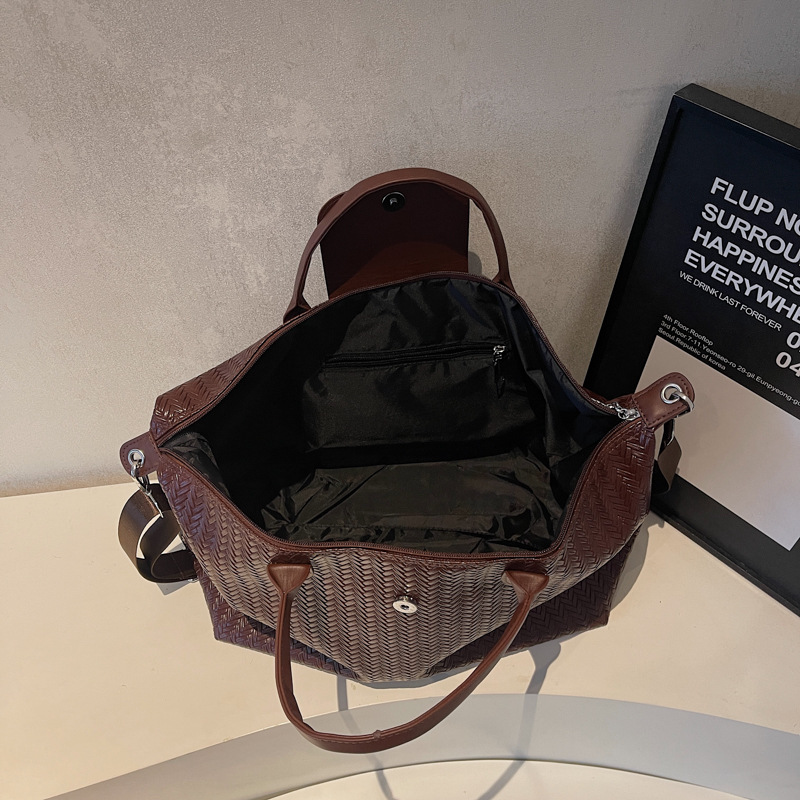 Bolsa de viaje de gran capacidad retro herringbone transfronteriza, bolsa de ejercicios deportivos al aire libre para mujeres, bolsa de hombro de un solo hombro.