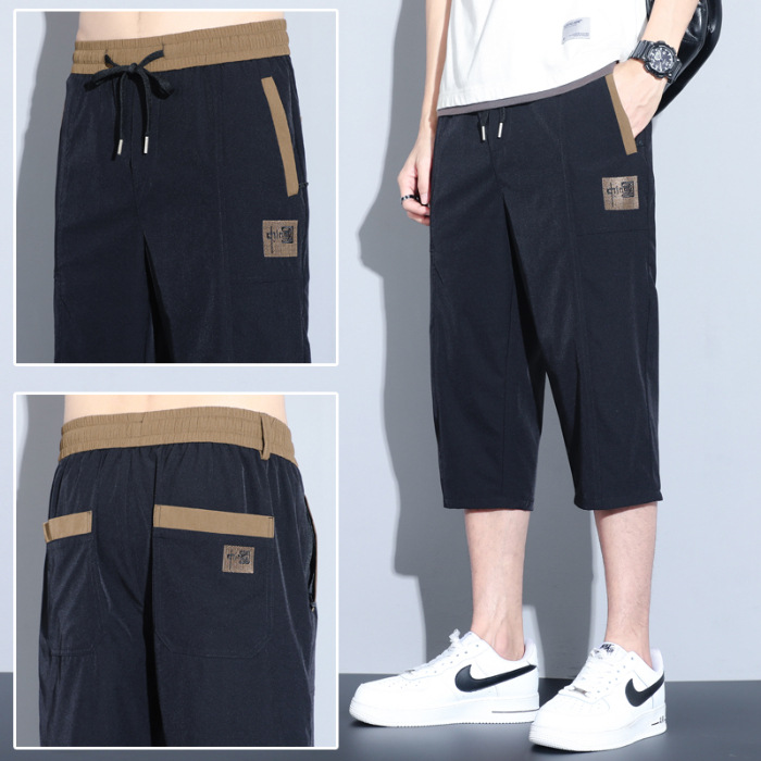 Black [cropped pants]