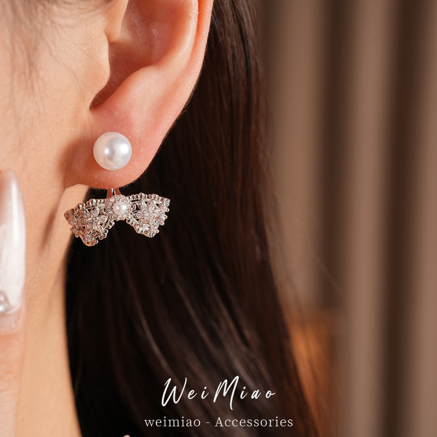 Agujas de plata Zircon arco perlas perlas orejetas coreanas exquisitas cotidianas de viaje versátil pendientes ligeros de lujo alta sensación de orejetas