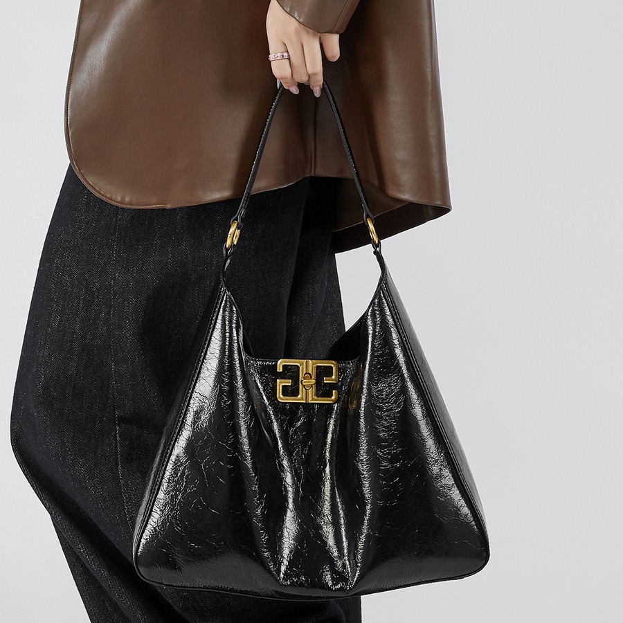 Bolso clásico de hombro único de alta sensación 2024 bolso axilar de cuero de vaca de nueva capa de cabeza bolso tote de gran capacidad