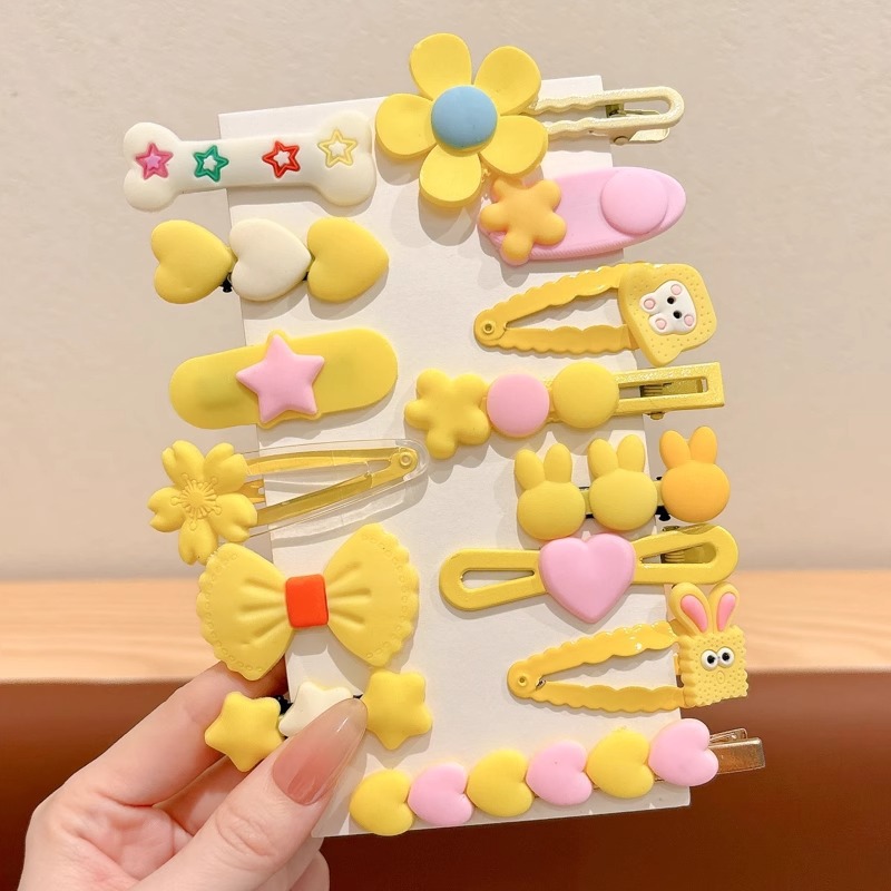 10 horquillas para niños de estrellas amarillas (juego de 14 piezas)