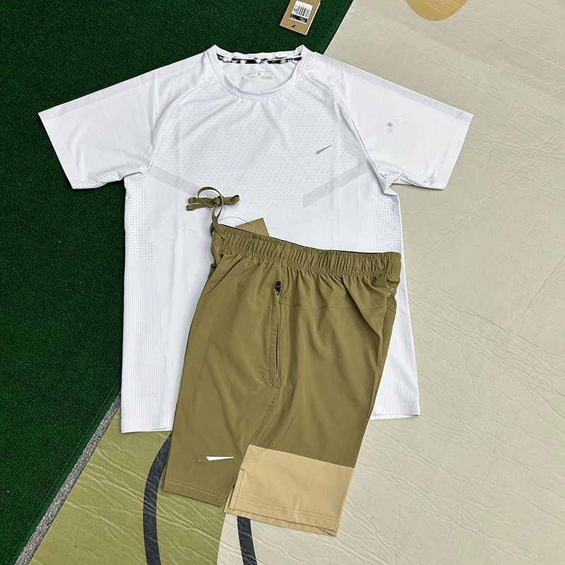 Nuevo al por mayor movimiento de secado rápido transpirable hombre camiseta de manga corta entrenamiento de hielo suelta chaqueta casual fitness correr