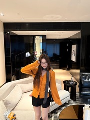 韩系氛围感早秋上衣镂空长袖橘色针织衫毛衣女别致修身V领打底衫