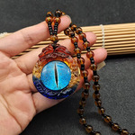 民族风新款三彩色琉璃项链女款天眼吊坠藏式玻璃挂件简约毛衣链