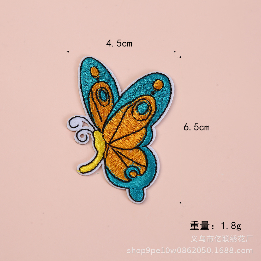 Fuente de fábrica colorida mariposa punto bordado adhesivo de tela autoadhesivo hermoso accesorios de ropa adorable adhesivo al por mayor