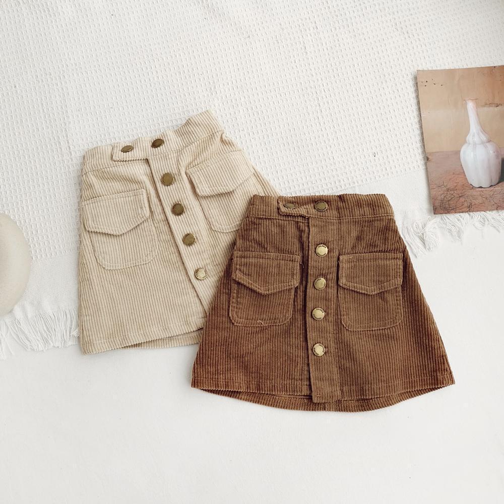 Primavera y otoño de las niñas falda de corto nuevo estilo extranjero de niñas meandruño una falda corta coreana para niños con una falda corta en forma de A