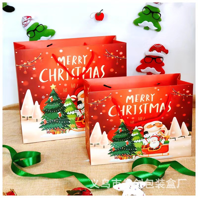 Nueva bolsa de regalo de Navidad bolso bolsa de papel al por mayor bolsa de regalo Portátil Bolsa de embalaje de dibujos animados
