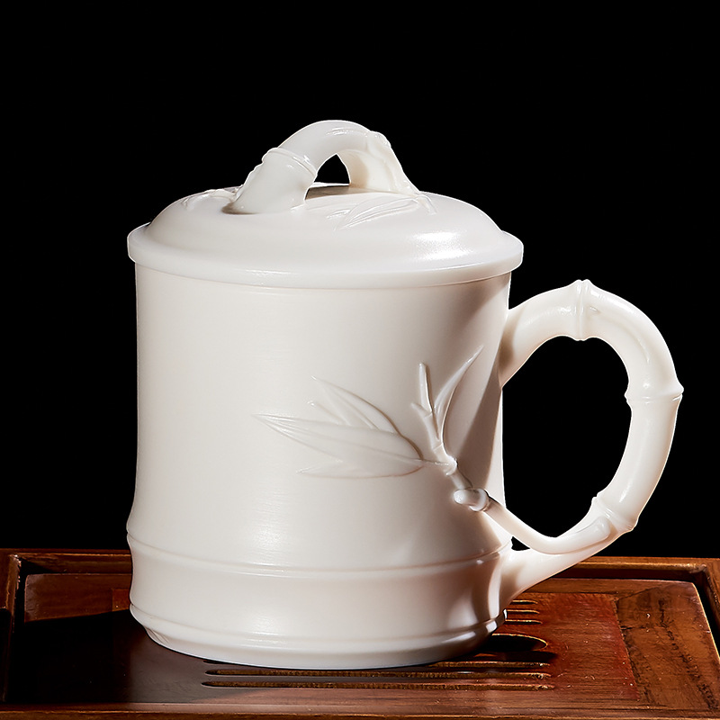 Porcelana color Mancheng Dehua porcelana blanca con tapa filtro oficina con revestimiento de separación taza de agua taza de té grande de cerámica personal