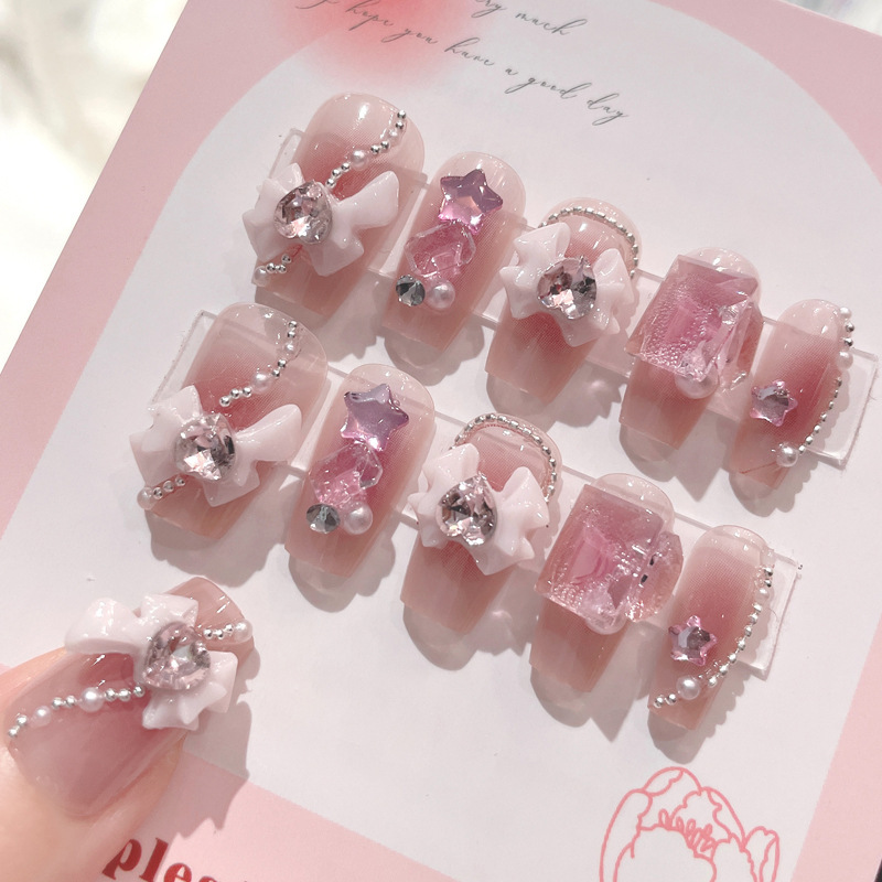 手作りのネイルは甲の完成品の高級な純粋な風の爪の貼る製品を身につけます。|undefined