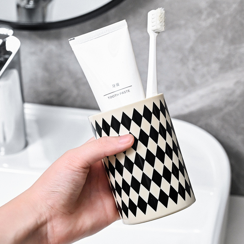 Taza de enjuague de alta calidad de pareja, taza de enjuague bucal, taza de plástico anti-moque, taza de cepillo de dientes para estudiantes.