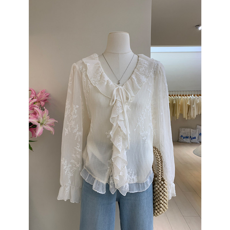 Soft and Lightweight Crush White V-Neck Tie-Front Jacquard Long-Sleeve Shirt with Delicate Ruffled Lace Trim Soft and Lightweight Crush White V-Neck Tie-Front Jacquard Long-Sleeve Shirt with Delicate Ruffled Lace Trim
