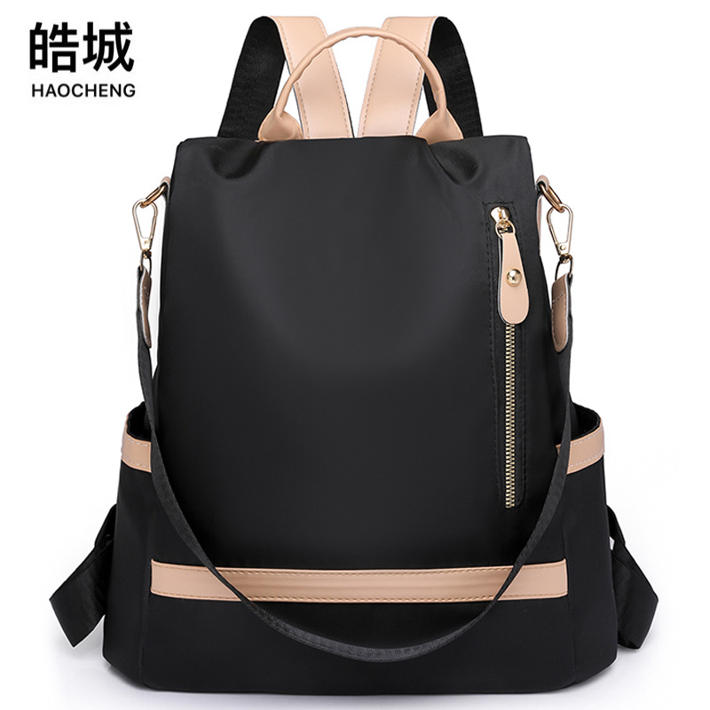 Venta al por mayor transfronteriza 2024 nueva versión coreana de la mochila antirrobo para mujer moda contraste color urbano viaje mochila marea