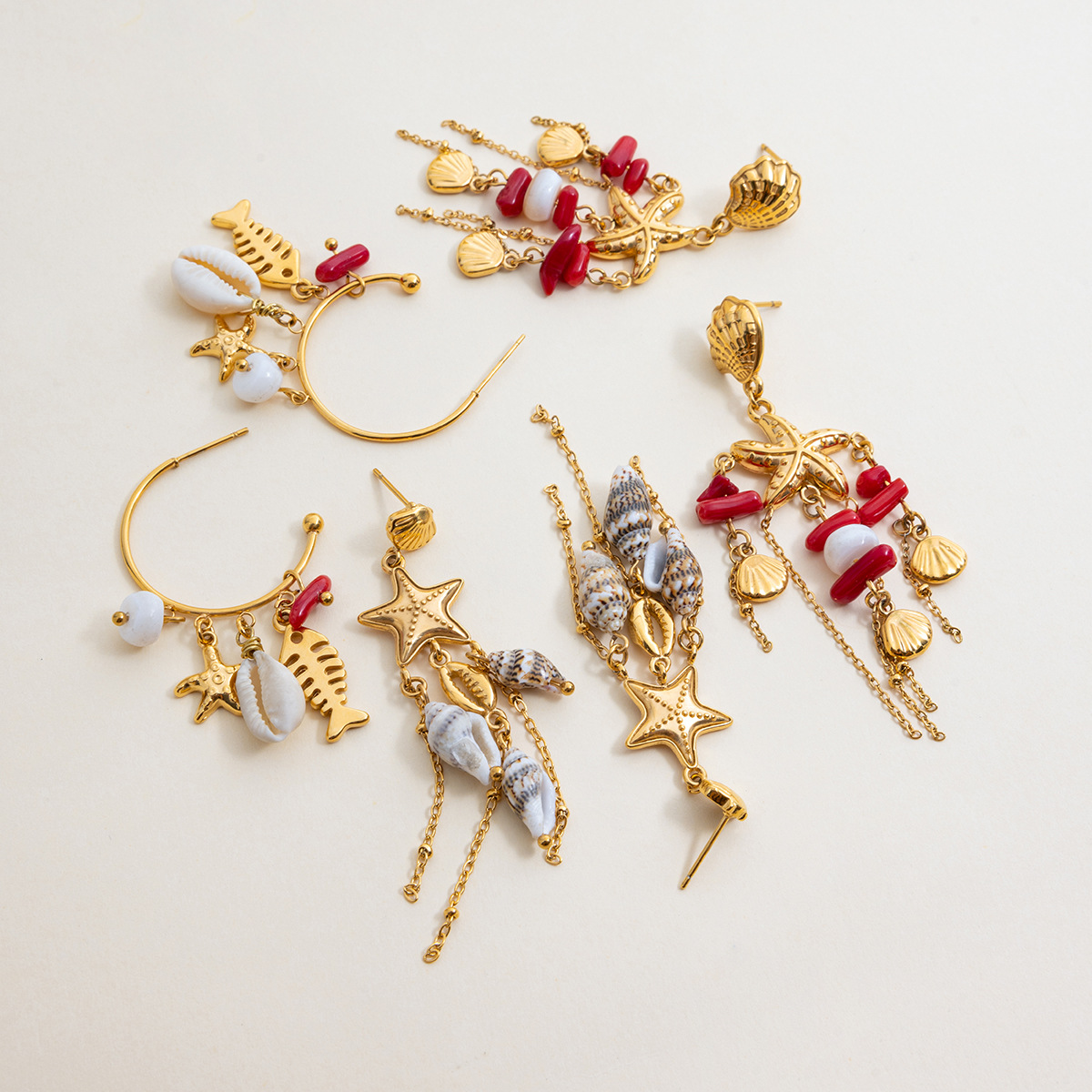 Venta caliente transfronteriza de Wanxing Pendientes de borla de concha de coral rojo bohemio Pendientes de sentido avanzado para mujer