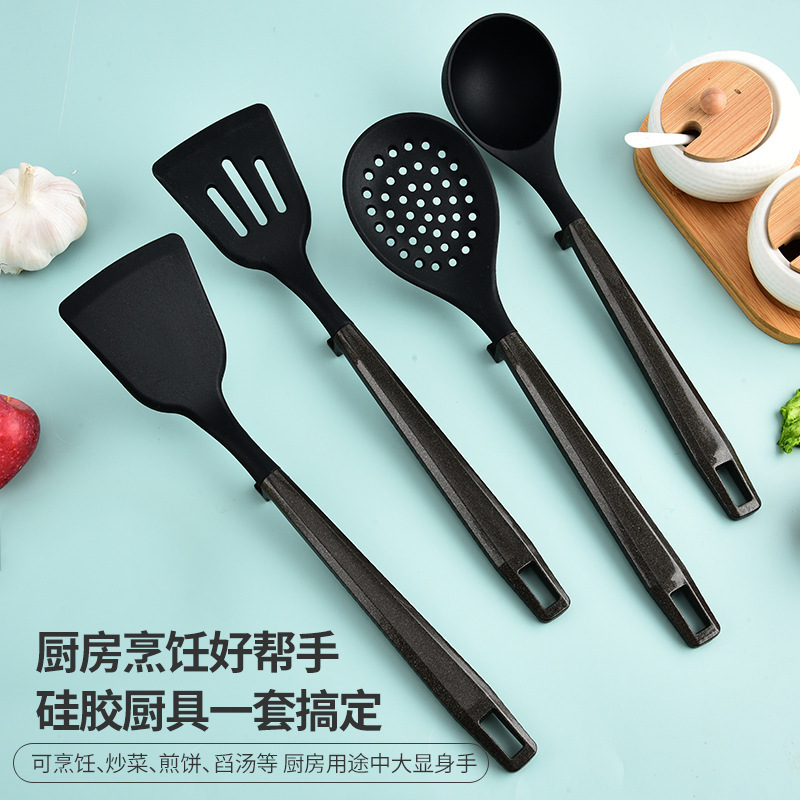 Juego de utensilios de cocina de pegamento de grado alimenticio de silicona de Amazon transfronterizo, juego de cocina de 7 piezas, espátula colgante, colador, fideos