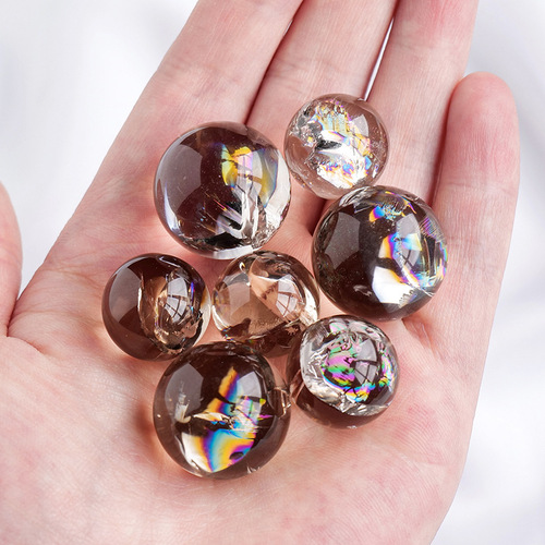 Manufacturer wholesale natural tea crystal smoky crystal colorful glue flower crystal ball seven-star array degaussing stone purification stone ornaments