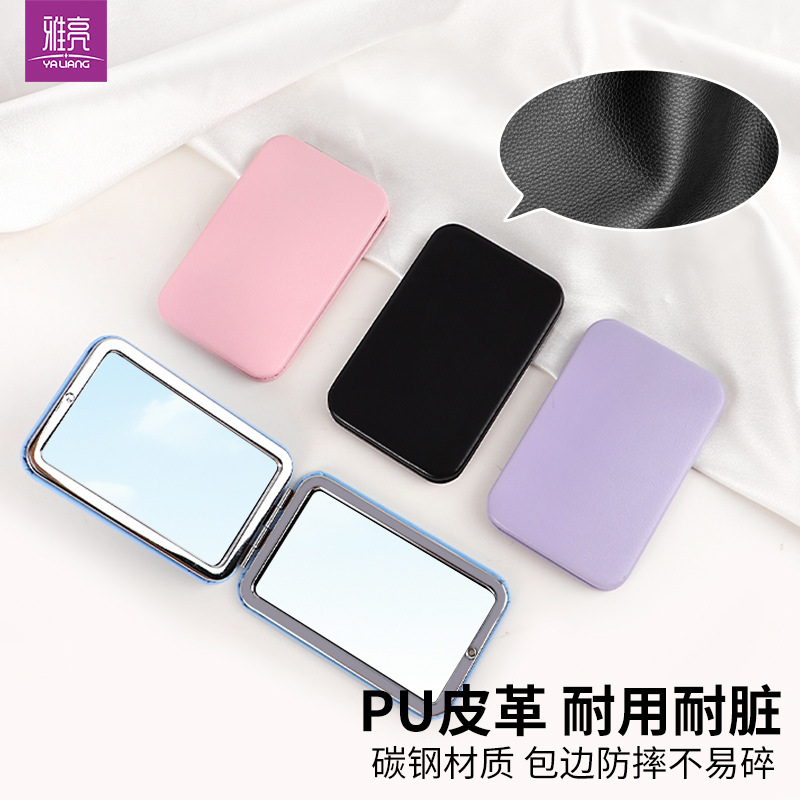 Spot al por mayor personalidad creativa celebridad de Internet PU portátil espejo de maquillaje plegable 97 espejo de moda rectangular espejo de doble cara