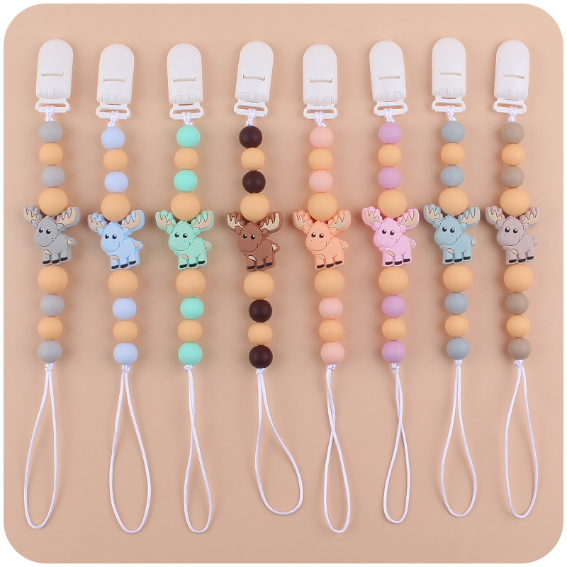 Nuevos suministros para bebés chupete cadena creativa bebé alce de silicona bebé mordedura molar anti-caída de la cadena
