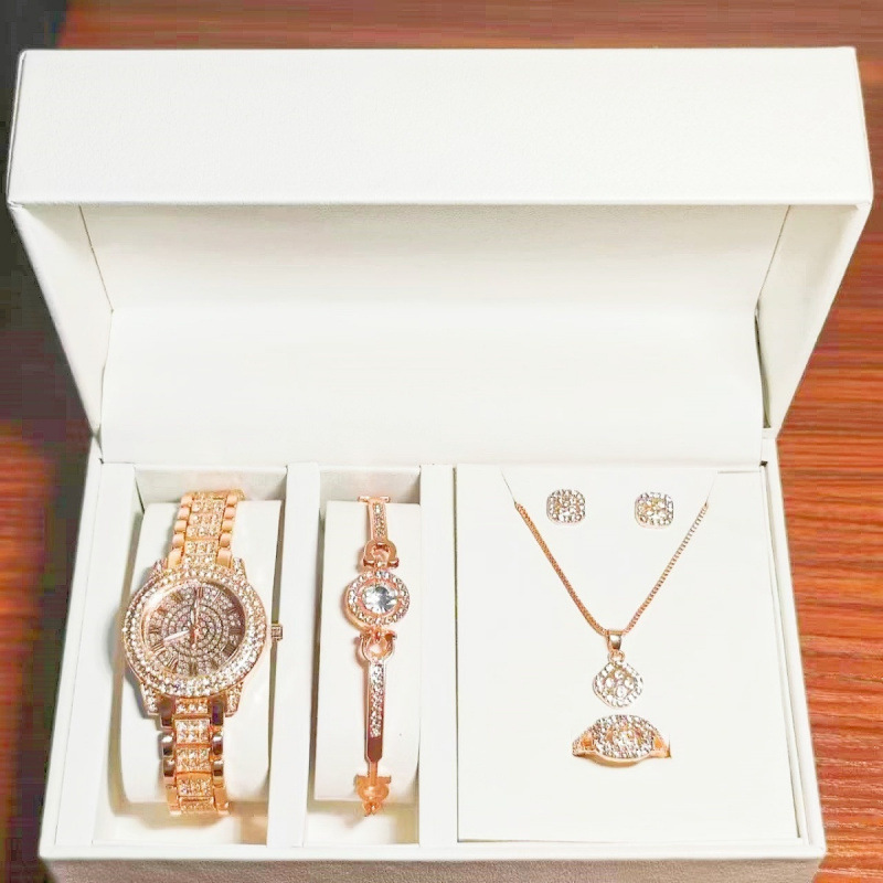 Часы с бриллиантами медного цвета + комплект из четырех предметов из гипсофилы (колье, кольцо, серьги и браслет)