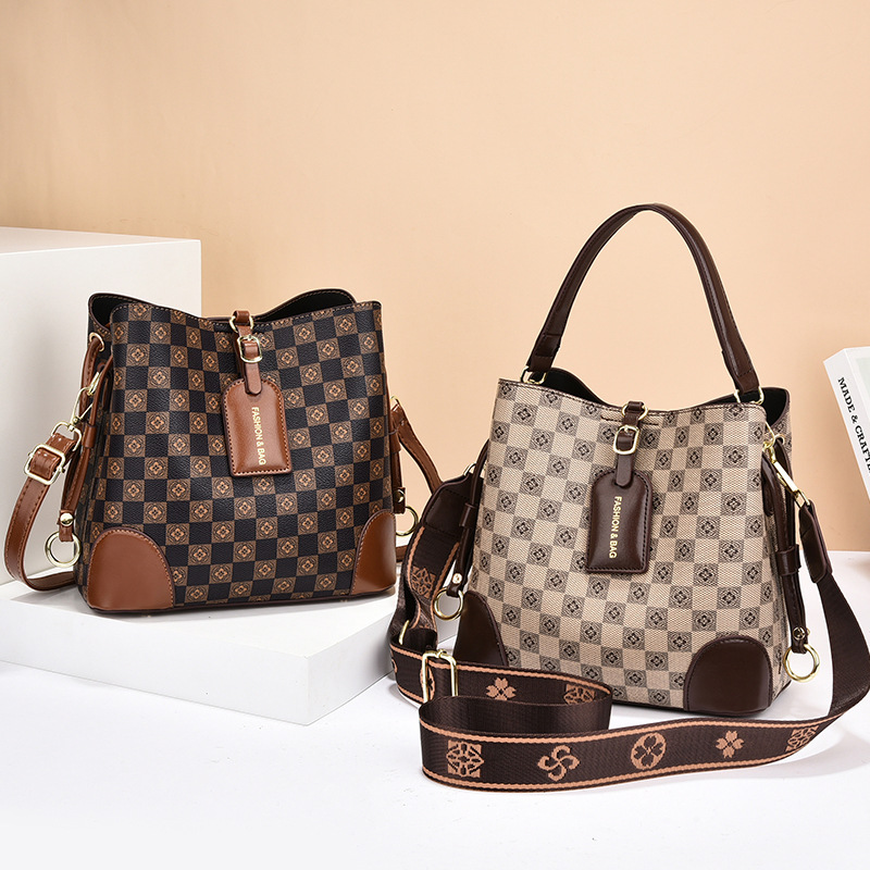 Borsa a secchiello di lusso donna con tracolla larga alla moda_voghion.com