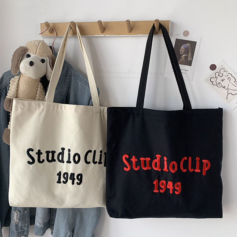 Estilo chino bordado bolsa de lona de los hombres femeninos de hombro nicho original simple letras artísticas de gran capacidad bolso de escuela del estudiante