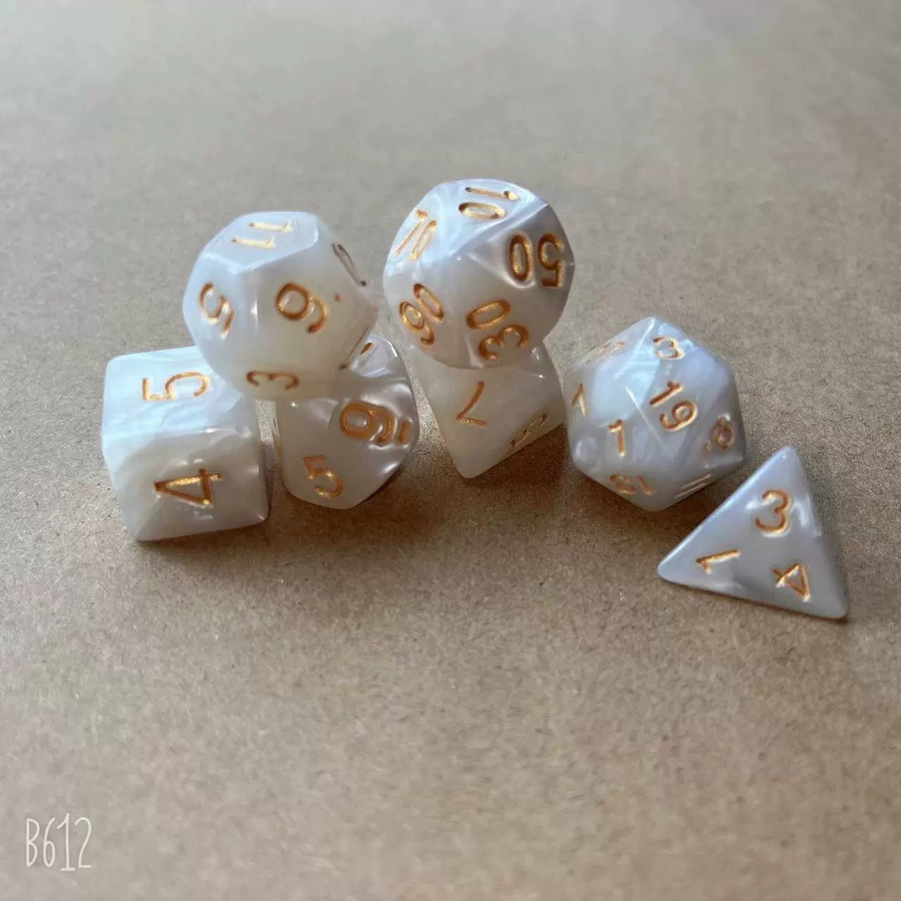 Granules from pearl, set, digital dice