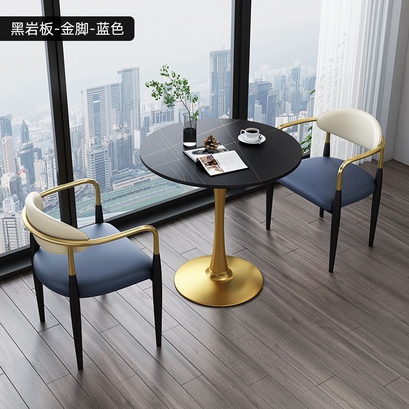Gold legs + black rock slab + blue leather, one table and two chairs