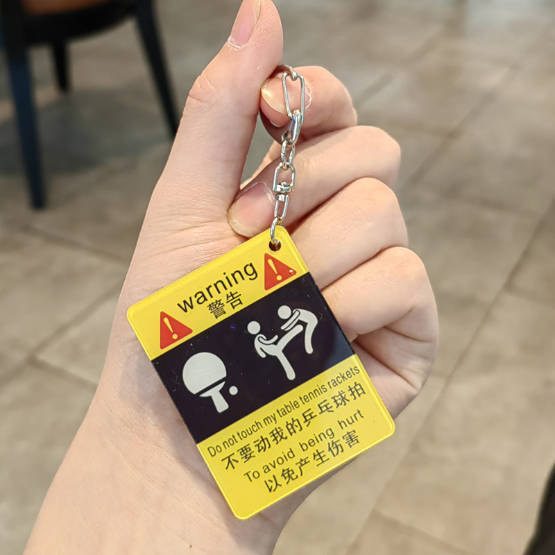 Kicking Ping Pong Warning Sign