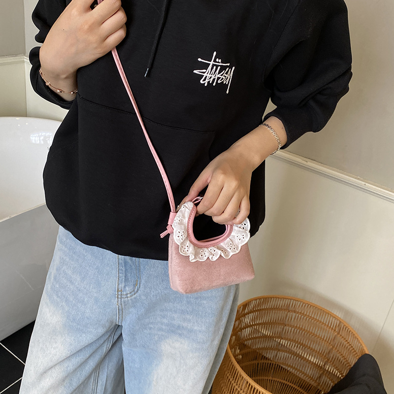 Bolsa de mano de encaje coreano para niñas, mini lindos bebés mochila simple de color sólido para niños.