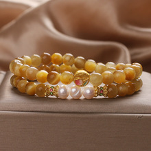 ��Ȼ����ʯ�pȦ���Ů�p��С�����µ�ˮ����B���ִ���Ů�ѶY��