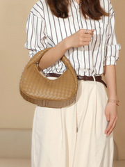 Casual, versatile, and effortlessly chic: minimalist, lightweight, woven "dumpling" handbag&mdash;perfect for the trendy, niche-style look that&rsquo;s all the rage among online influencers!