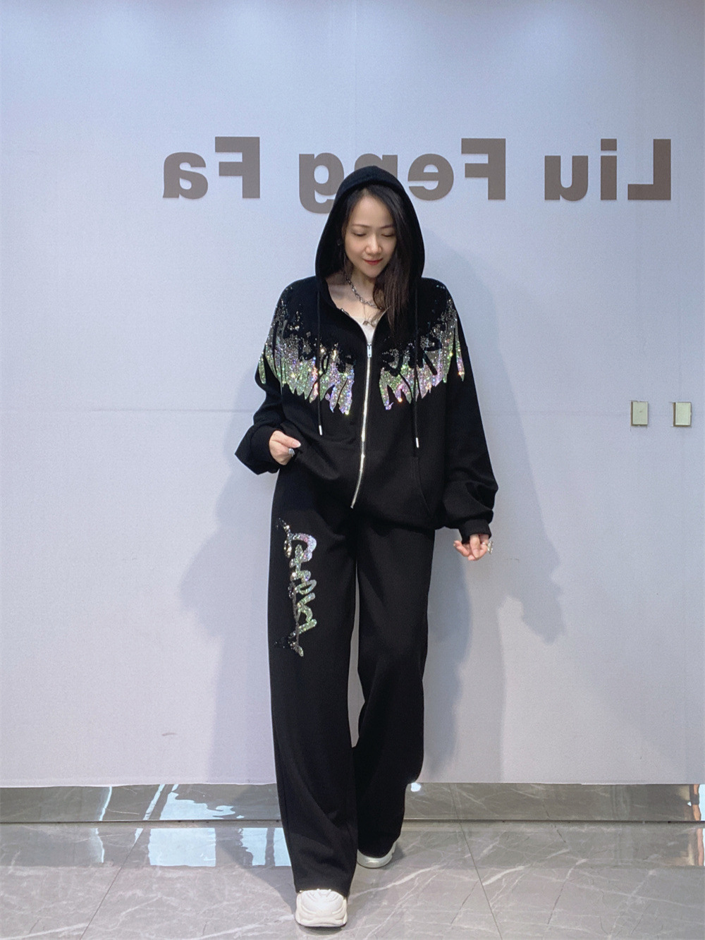Transfronterizos de ropa de mujer de otoño y invierno de dos piezas casuales con cremallera chaqueta con capuzas chaqueta chaqueta de taladro caliente pantalones rectos grandes para mujeres