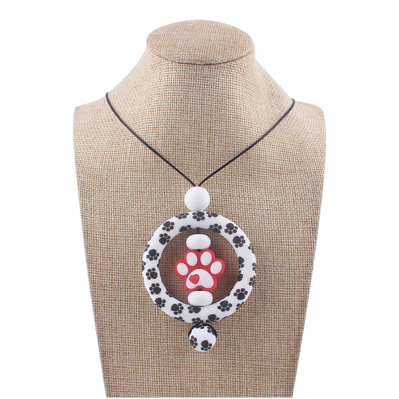 Suministros para bebés de dibujos animados perro garra collar creativo bebé cuentas de silicona mordedura molar COLLAR COLGANTE hecho a mano