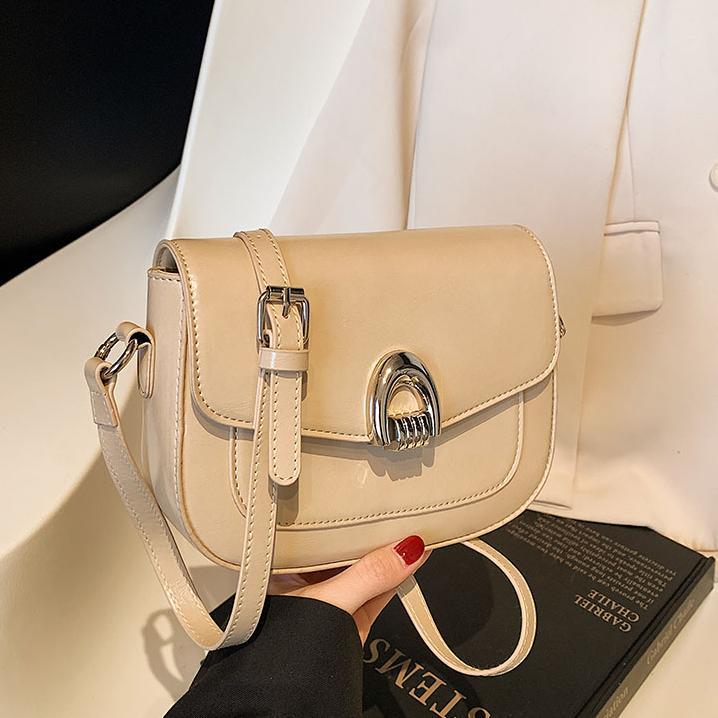 Simple bolso de silla de ocio retro mujer 2025 nuevo estilo extranjero bolso de hombro universal de moda bolso de mochila