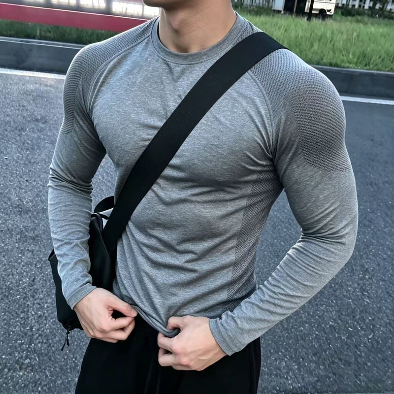 American-style seamless jacquard shark pattern long-sleeve sports shirt for men, elastic, slim-fit, quick-drying, breathable, for running and training American-style seamless jacquard shark pattern long-sleeve sports shirt for men, elastic, slim-fit, quick-drying, breathable, for running and training