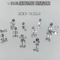蝶結びの耳の骨は寝ます。耳を摘む必要はありません。
