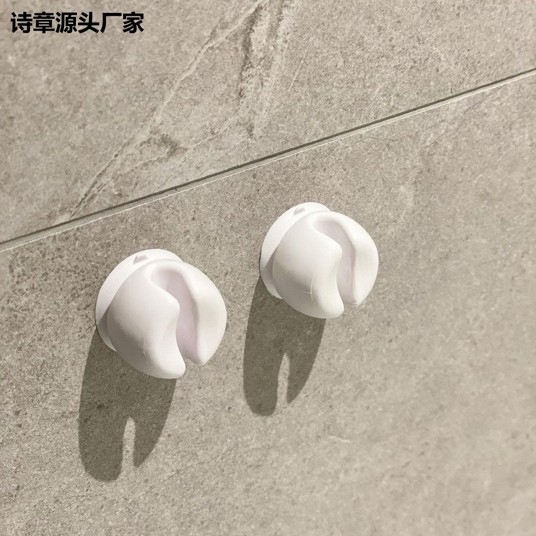 Japanese use suction cup toothbrush holders, electric toothbrush holders, simple suction cup hooks, wall-mounted toothbrush storage