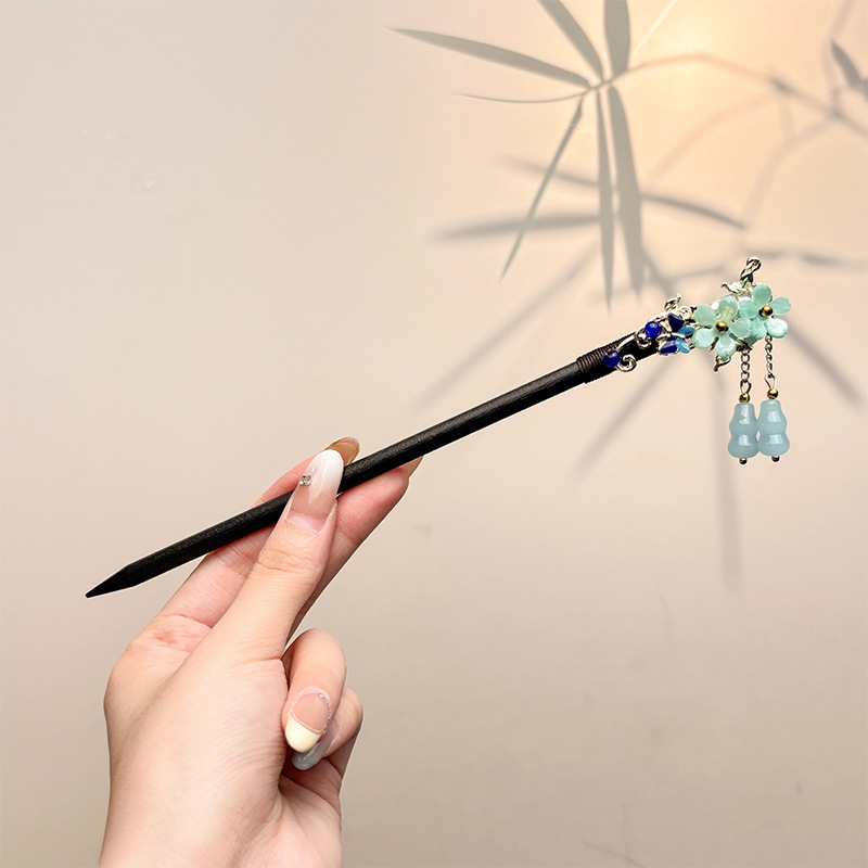 Nueva horquilla china 2025 nuevo estilo estilo antiguo horquilla mujer falda de cara de caballo de alta calidad estilo nacional horquilla de madera paso a paso horquilla tocado