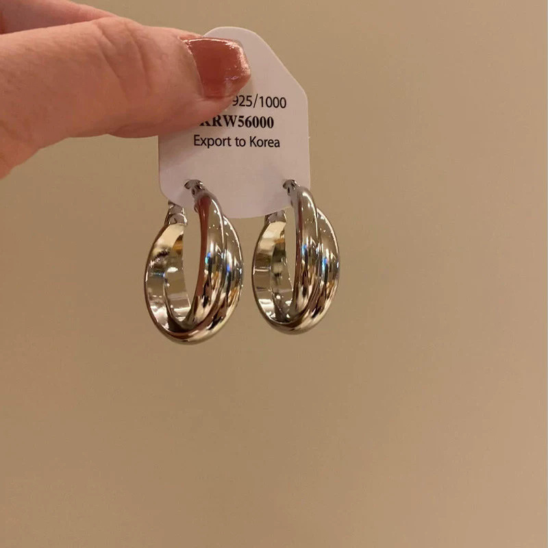 925 aguja de plata estilo de Hong Kong retro pendientes de metal pendientes de anillo liso geométrico de alto grado de las mujeres pendientes exagerados del viajero del todo-fósforo
