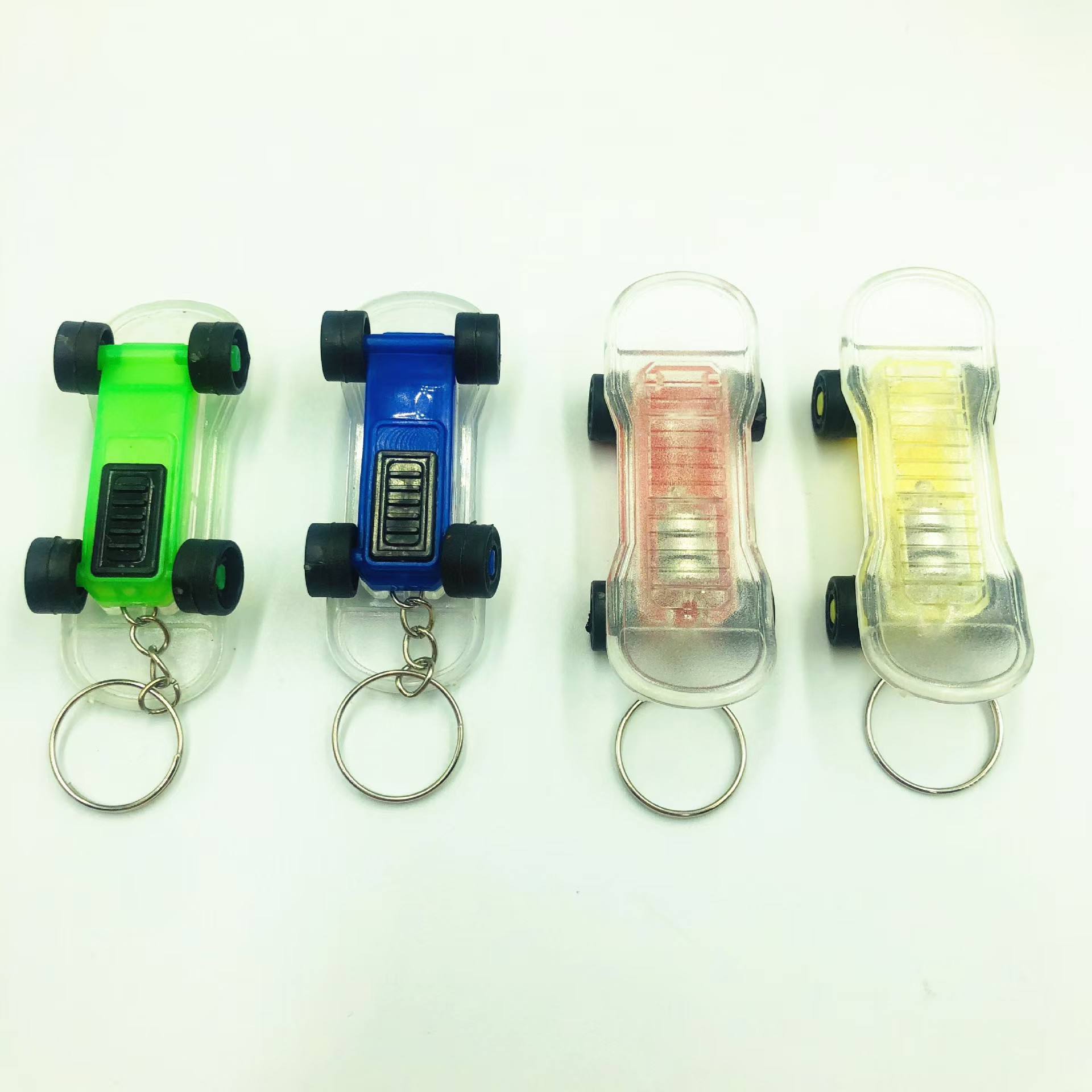 LED de dibujos animados luminoso llavero lámpara de color bolsos creativos colgantes juguetes luminosos para niños micro comercio escaneo de código pequeño regalo