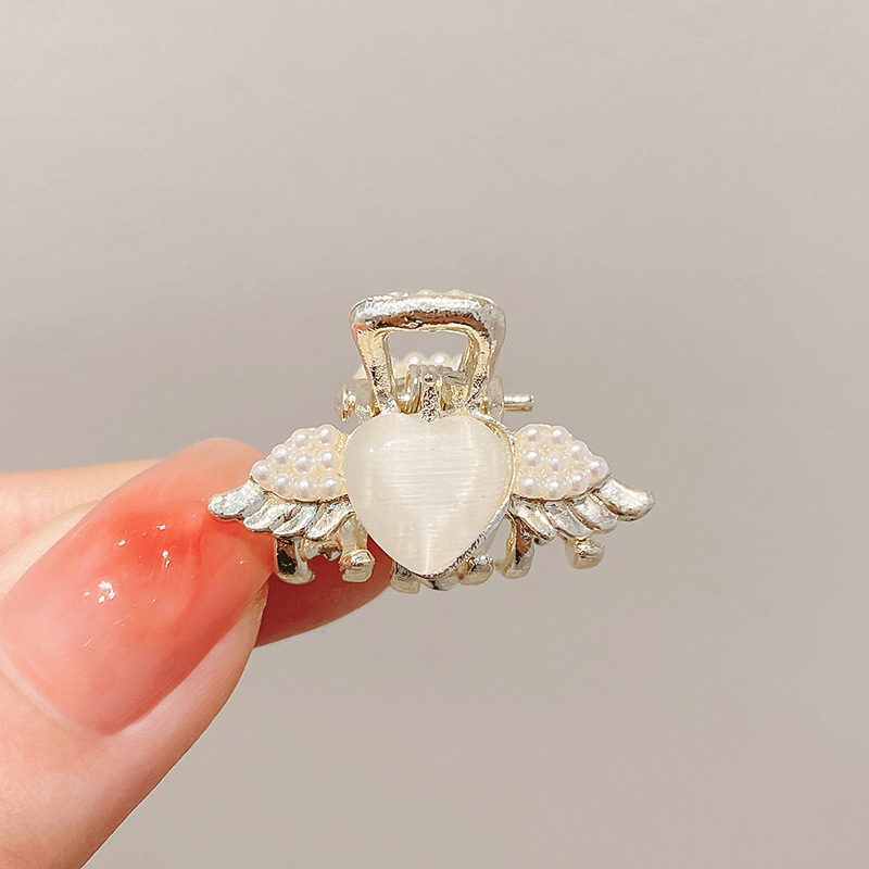 Ojo de gato alas-perlas