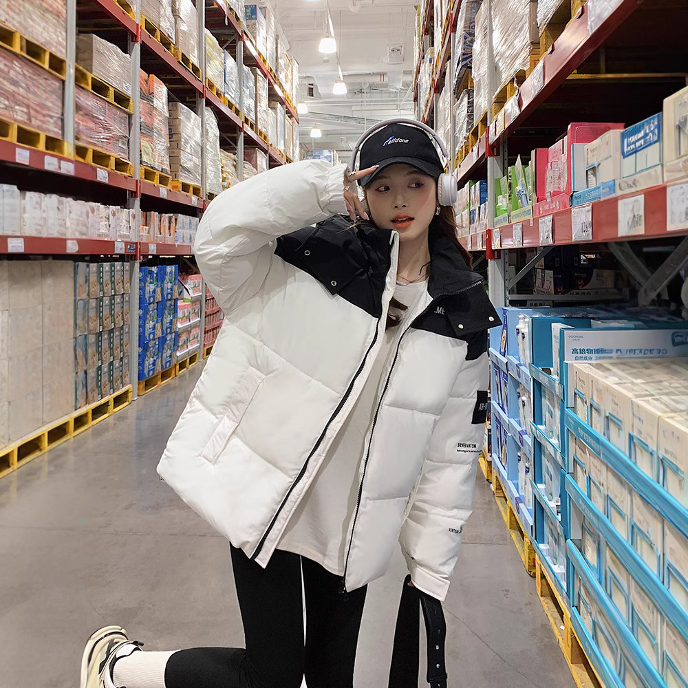 Comercio exterior invierno de 2025 nueva ropa de algodón de color grueso con sombrero de mujer ropa de algodón suelta ropa de pan chaqueta de algodón