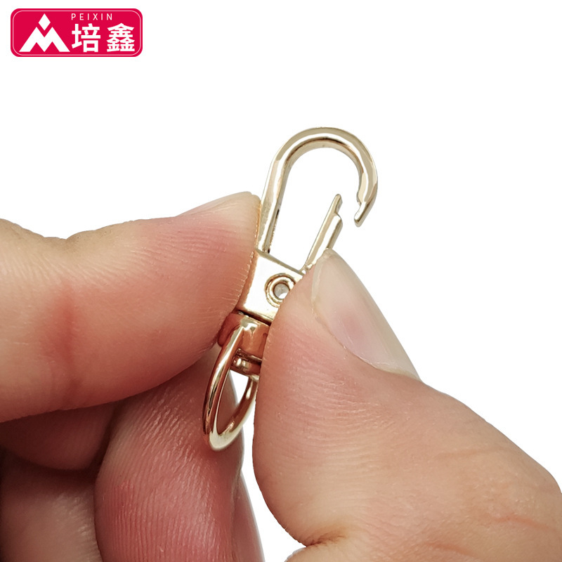フックの部品亜鉛合金の小さい板は金属のキーホルダーを掛けます。|undefined