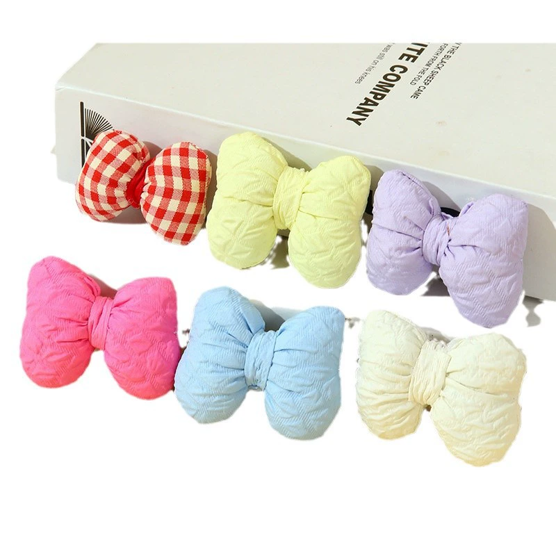 Small cute knitted hat, scarf with bow, small bag, pack, accessory