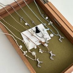 韓国ブロガーと同じスタイルの編み込みロープ子犬タッセルネックレスニッチハイエンドパーソナライズされたファッショナブルな女性用ロングセーターチェーン