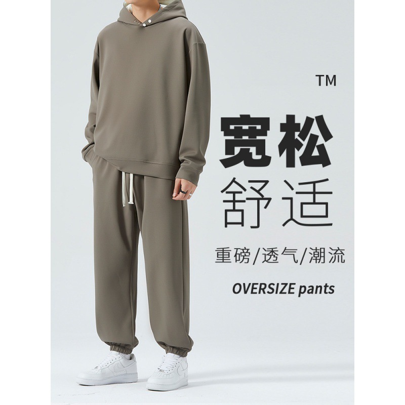 Suéter con capucha transfronterizo traje deportivo casual hombres 2023 primavera y otoño marca de moda suéter suelto pantalones conjunto de dos piezas