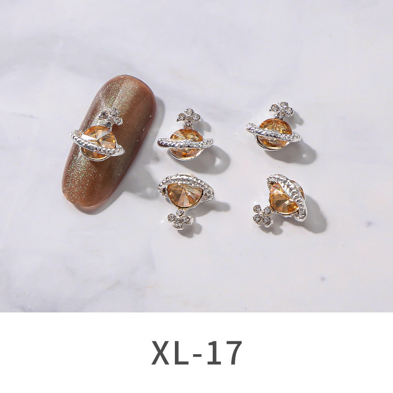 2021 Nueva joyería de Planeta de aleación de uñas popular transfronteriza brillante multicolor Luz de lujo incrustado en diamante uñas decoración de cielo estrellado