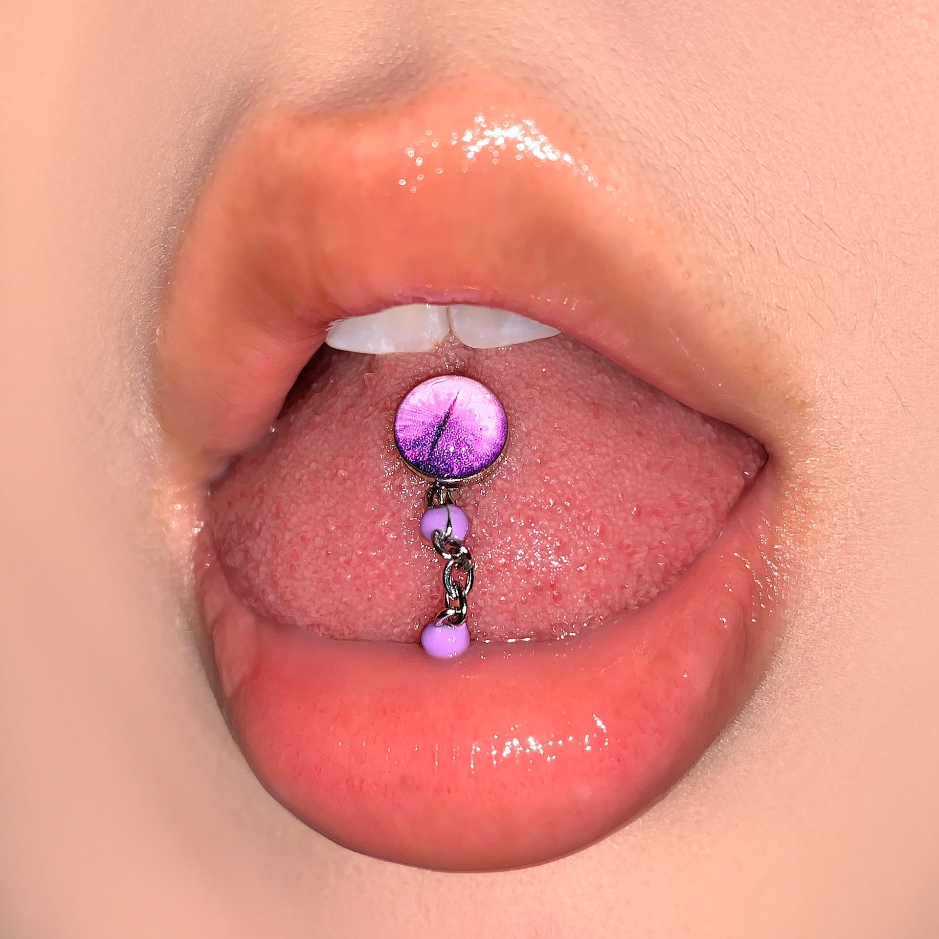 Silver pointed spike labret stud material detail