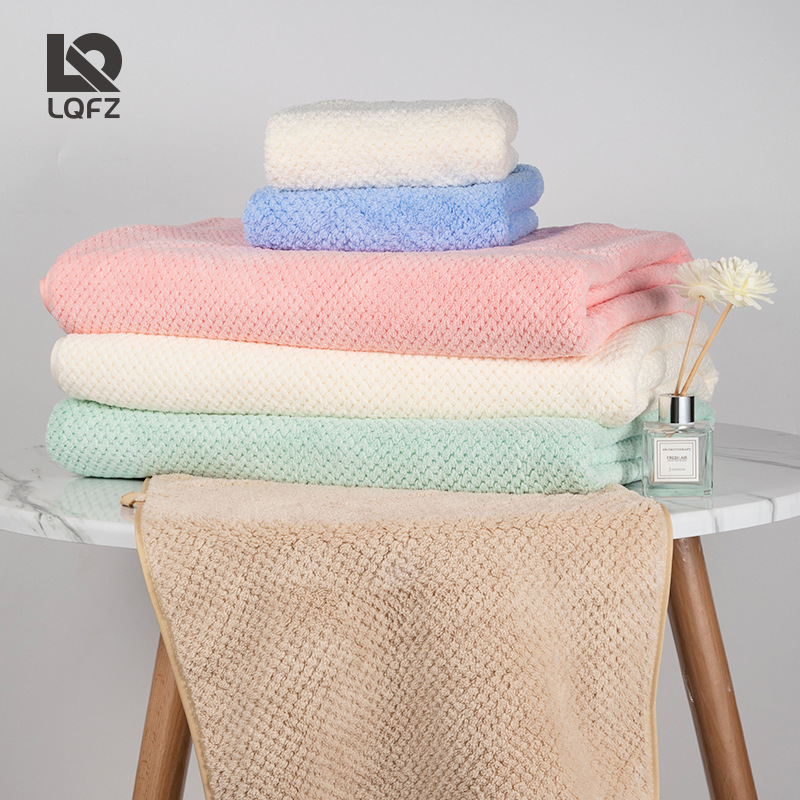 Toalla de rejilla de piña al por mayor de fábrica Toalla de pareja para hombres y mujeres Toalla de baño absorbente Toalla de lavado facial personalizada de terciopelo de coral para el hogar